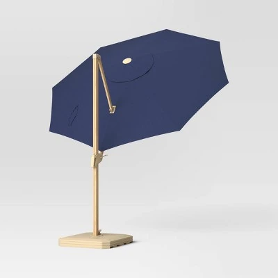 11'x11' Offset Solar Outdoor Market Umbrella Navy - Light Wood Pole - Threshold™ 11'x11' Offset Solar Outdoor Market Umbrella Navy - Light Wood Pole - Threshold™ -Threshold shop GUEST 62667af1 2dcf 4cdc 8cab ed800ef5bee9