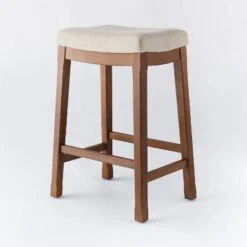 Candor Wood And Upholstered Saddle Counter Height Barstool - Threshold™ 7 Candor Wood And Upholstered Saddle Counter Height Barstool - Threshold™ -Threshold shop GUEST 9752c844 5eab 4428 9bc4 84b07e39c310